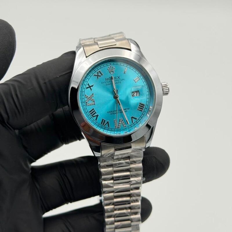 Aqua Blue Dial Silver Watch – Roman Numerals & Jubilee Bracelet