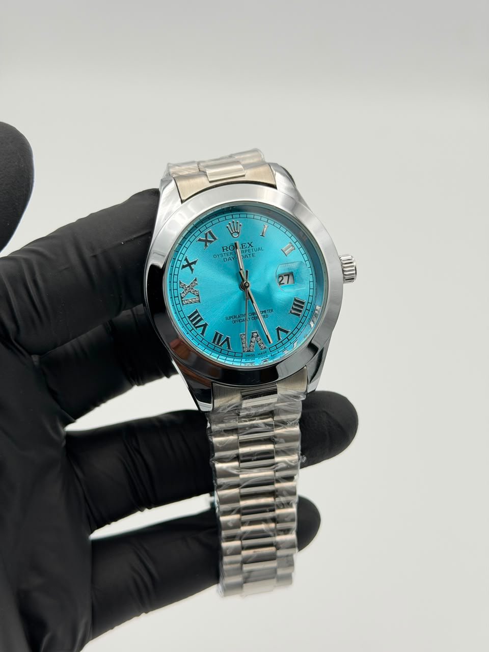 Aqua Blue Dial Silver Watch – Roman Numerals & Jubilee Bracelet