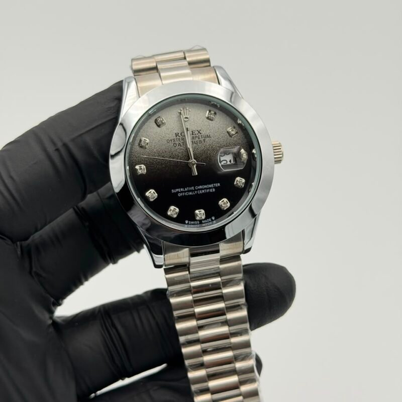 Black-gradient-dial-silver-watch-with-stainless-steel-bracelet-and-date-display.jpeg Black Gradient Dial Silver Watch – Crystal Markers