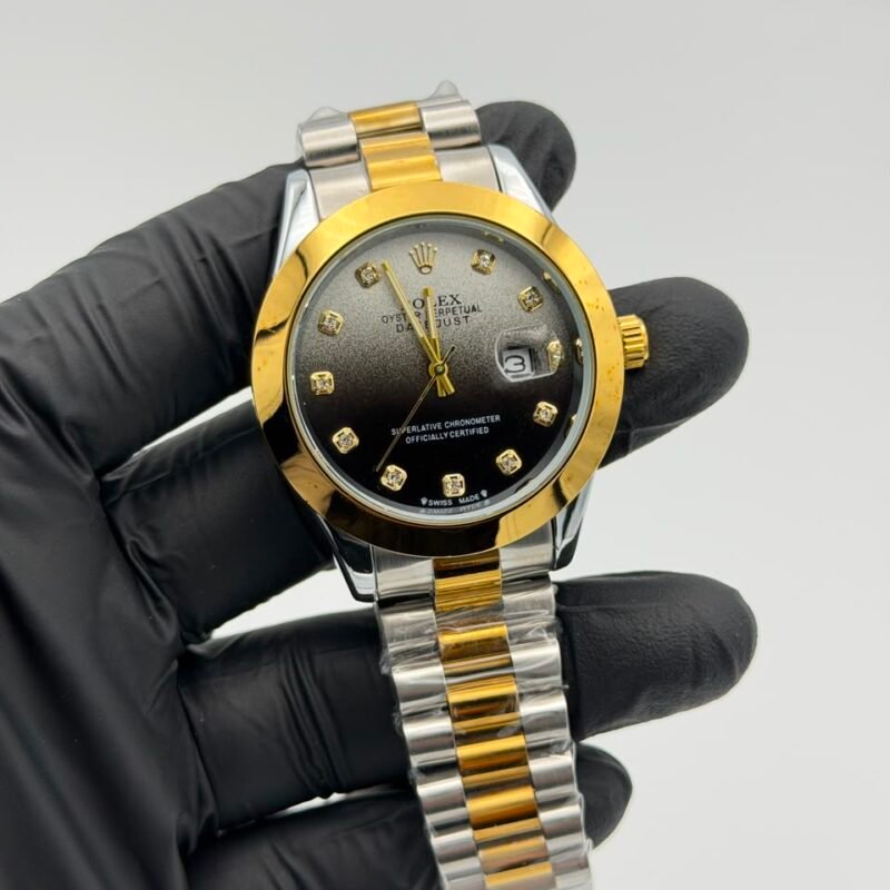 Black-gradient-dial-two-tone-gold-and-silver-watch-with-date-display.jpeg Black Gradient Dial Two-Tone Watch – Gold & Silver Bracelet