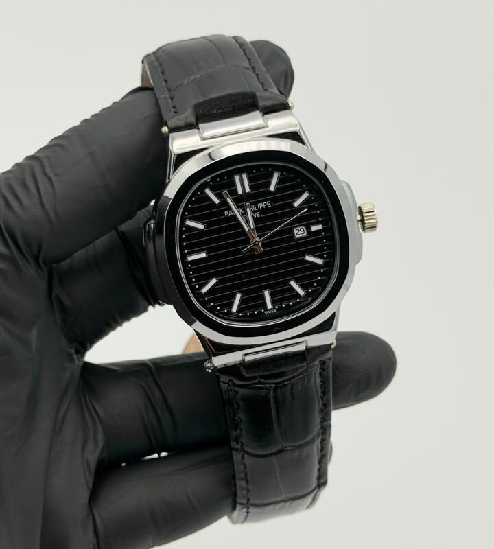 Black textured dial silver-tone quartz watch with black leather-style strap Black Textured Dial Leather Strap Quartz Watch