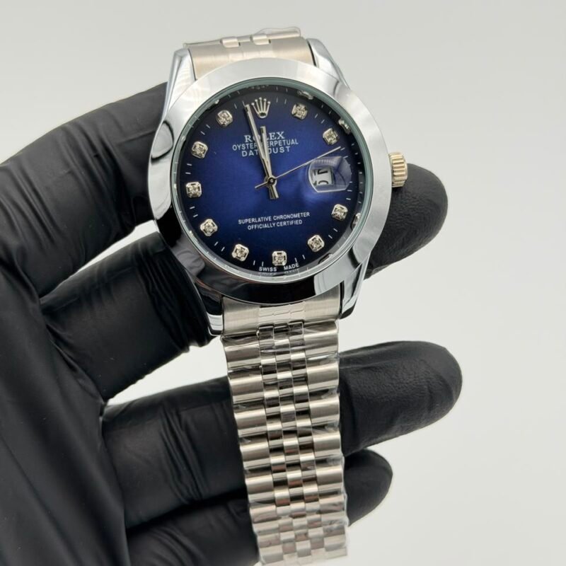 Blue-dial-classic-watch-with-stainless-steel-Jubilee-bracelet-and-date-display.jpeg Blue Dial Classic Watch – Jubilee Bracelet