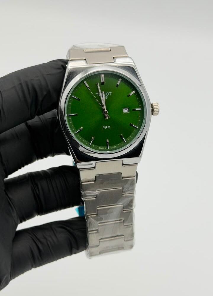 Green dial silver-tone integrated bracelet quartz watch with date display Green Dial Integrated Bracelet Quartz Watch