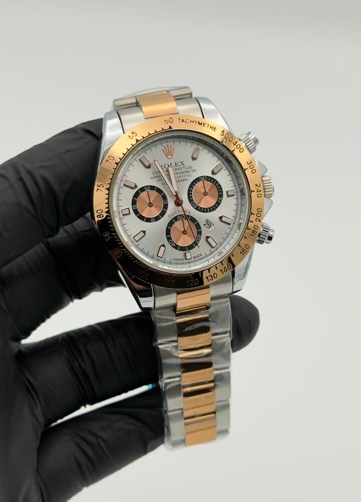 Two-tone white dial chronograph style quartz watch with rose gold accents Two-Tone White Dial Chronograph Style Quartz Watch