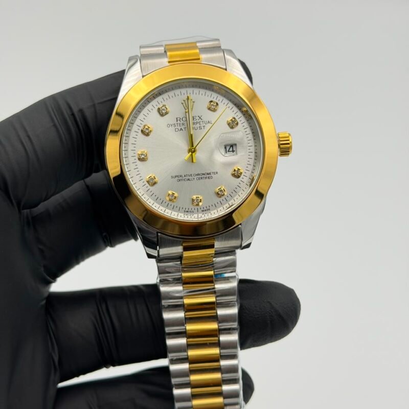 White-dial-two-tone-gold-and-silver-watch-with-crystal-style-hour-markers.jpeg White Dial Two-Tone Watch – Gold & Silver Bracelet